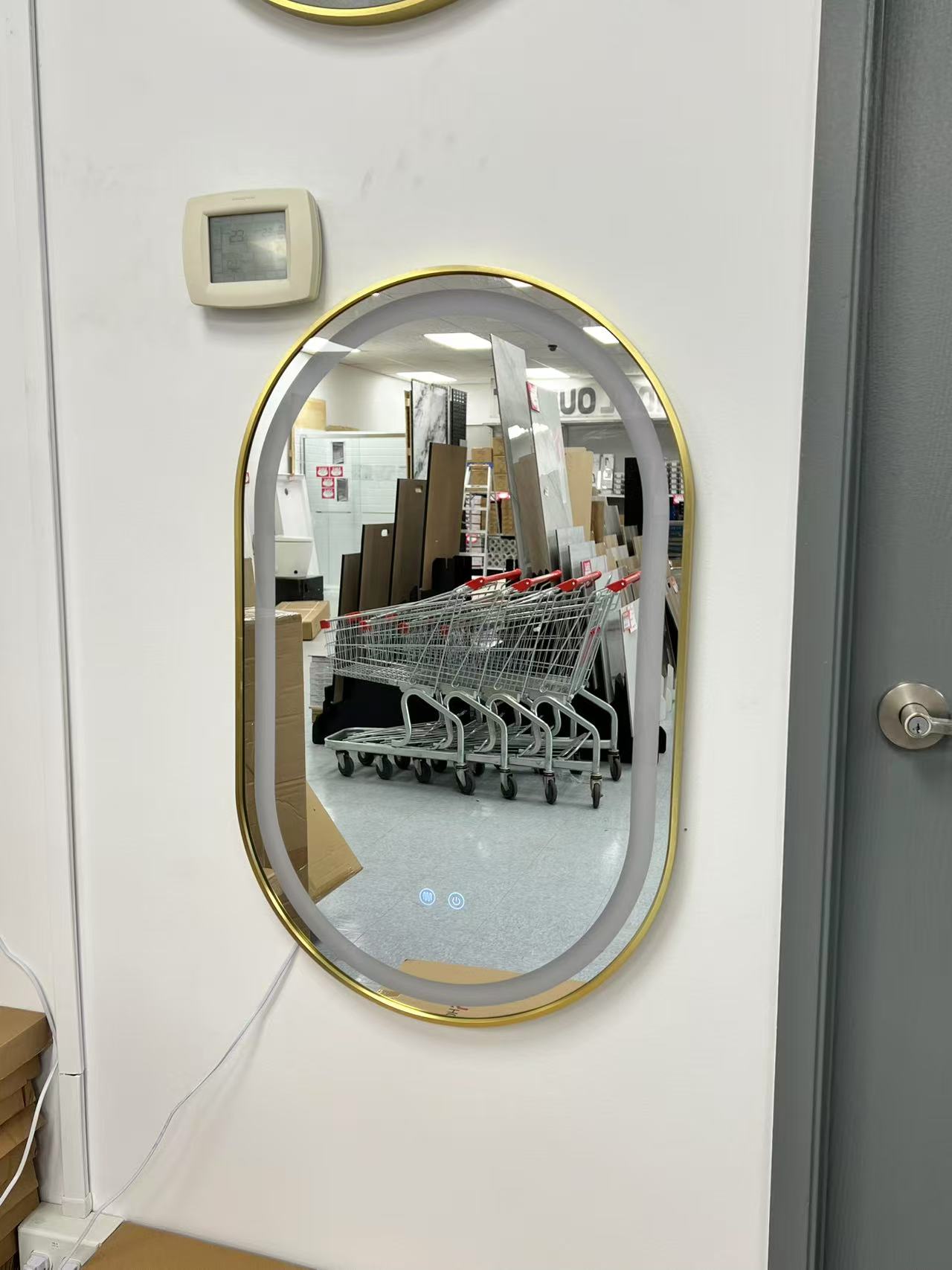 Oval LED Mirror with Golden Frame – 20"x32" image 0