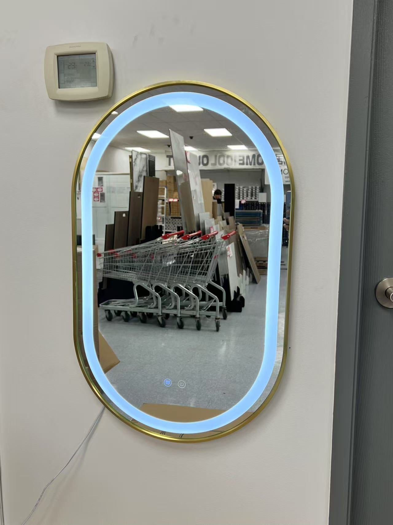 Oval LED Mirror with Golden Frame – 20"x32" image 1